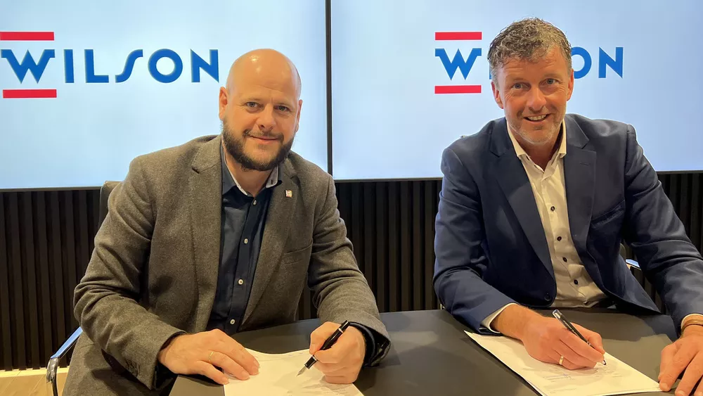 Metizoft and wilson signing contract